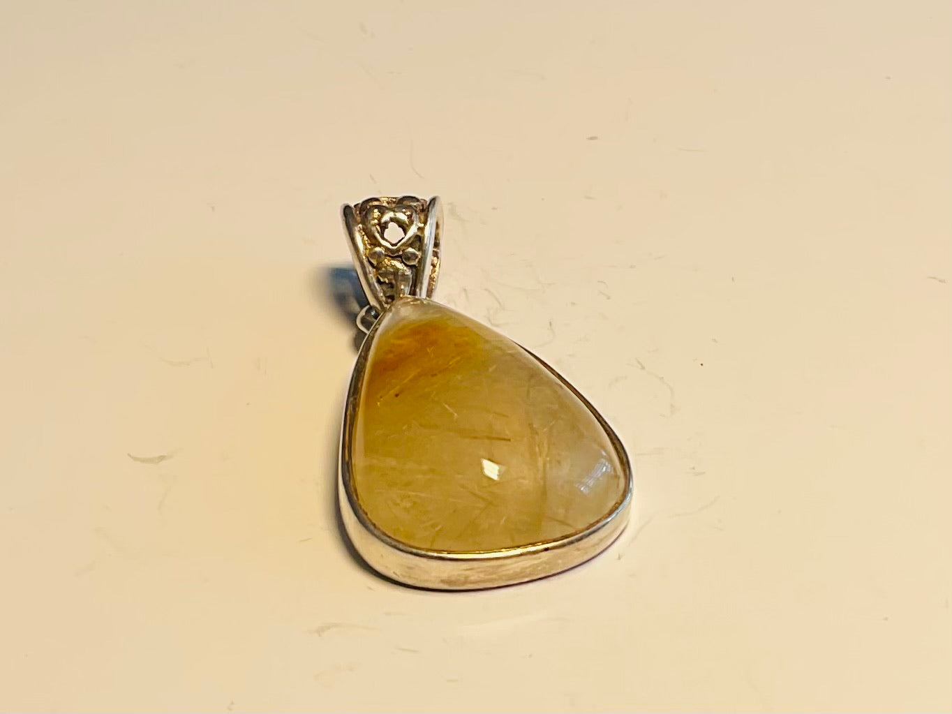 Rutilated quartz pendant